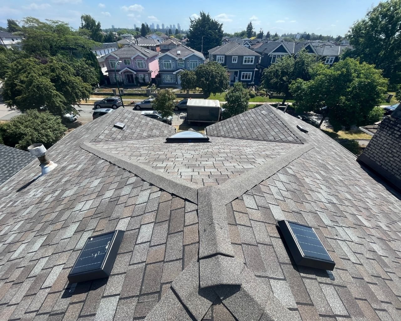 Scarlet Roofing & Gutters crew member performing a roof inspection