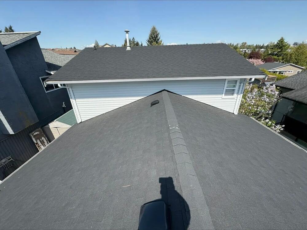 Close-up of new siding and metal fascia trim on a home renovation in Delta, BC