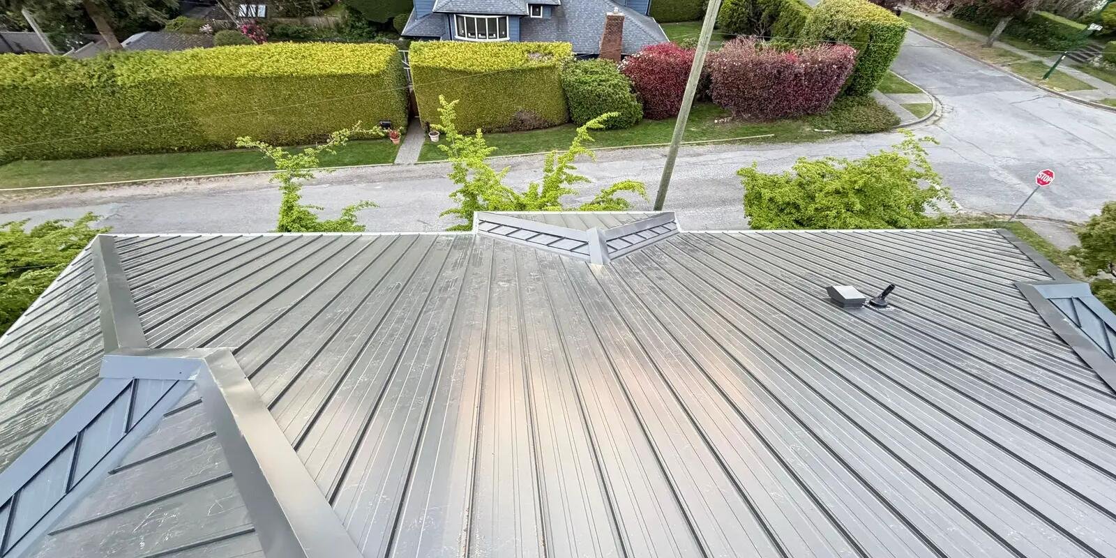 New seamless gutter and leaf guard system installed on a home in Coquitlam, BC