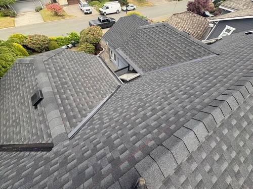 Full Roof Replacement — Aerial view of the completed roof across the whole home.