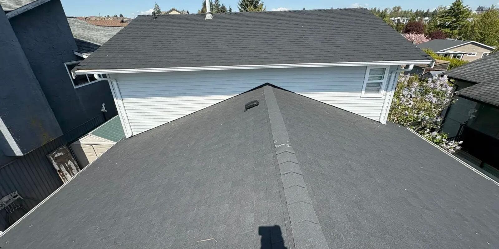 Aerial view of two newly replaced skylights on a roof in Surrey, BC
