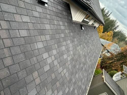 Skylight Replacement — Finished shingle work surrounding the new skylight.